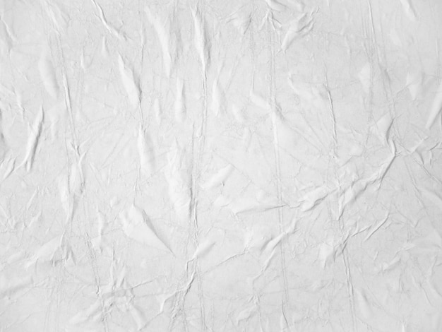 Texture de papier blanc vierge collée sur le mur