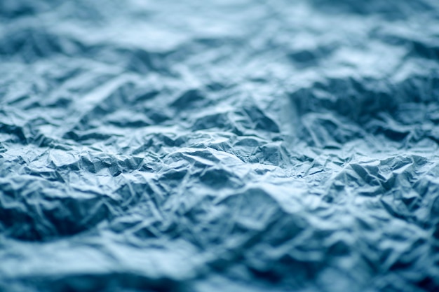 Texture de papier bleu froissé