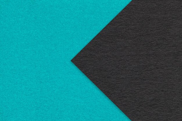 Photo texture papier cérulean fond deux couleurs avec flèche noire carton bleu artisanal et turquoise
