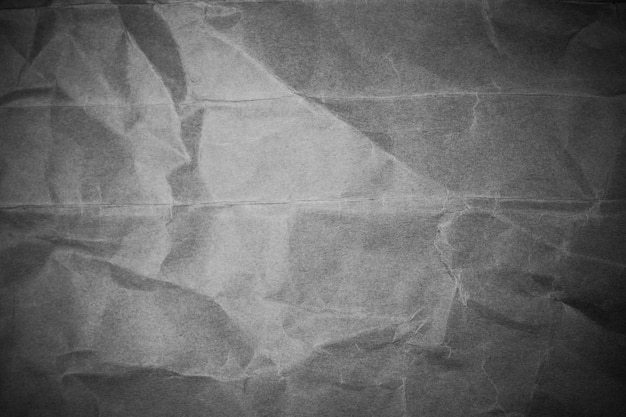 Photo texture de papier gris froissé.