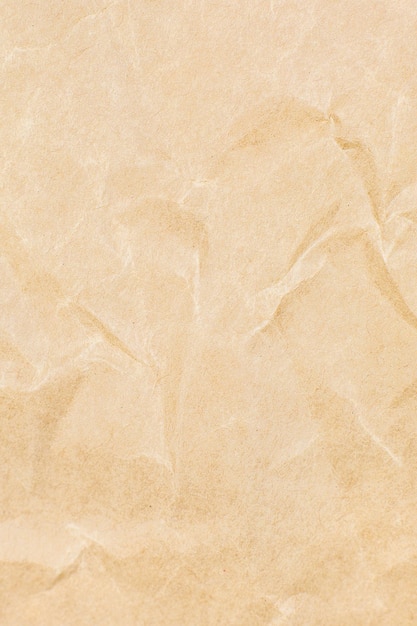 Texture de papier kraft brun, arrière-plan naturel de recyclage écologique.