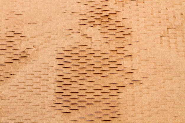 Une texture de papier perforé dans une vue rapprochée