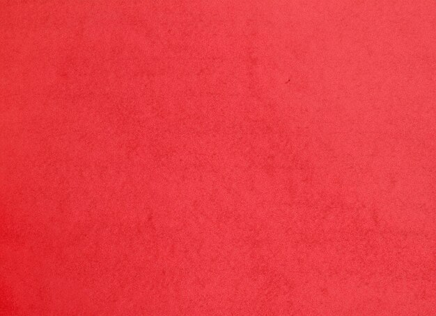 Texture de papier rouge ou fond