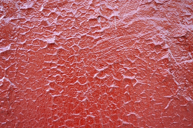 Texture de peinture fissurée et plâtre griffé.