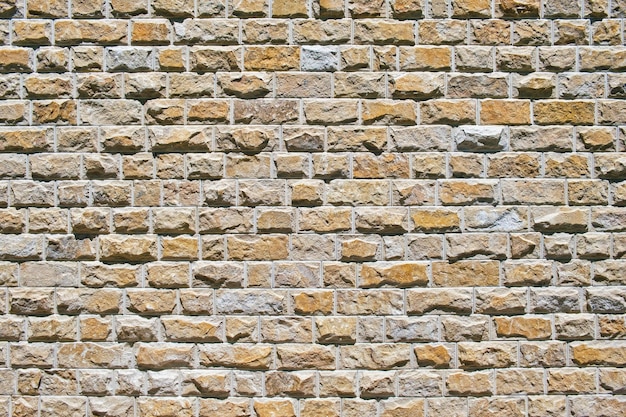 Photo texture de la pierre décorative moderne motif du mur de briques