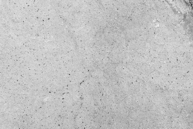 Texture de pierre poreuse à grain gris. fond de béton.