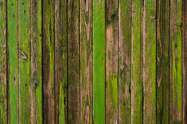 Texture de planche de bois peint vert et bleu peint craquelé