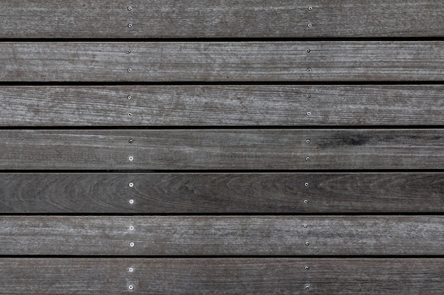 Texture de plancher de planche de bois patiné. Fond de chaussée en bois. Modèle de pont maison abstraite