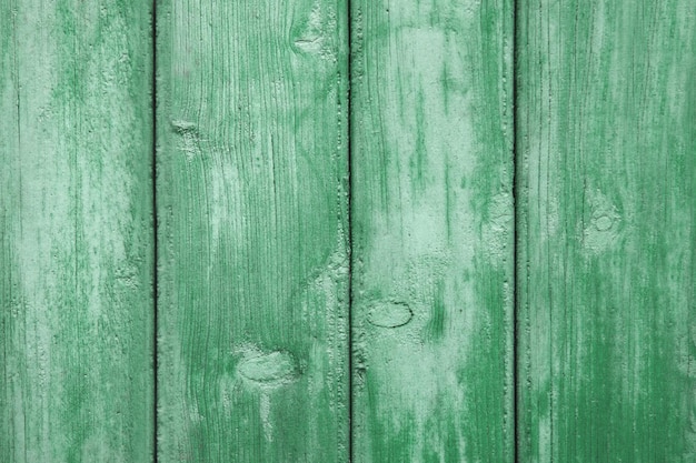 La texture des planches de bois aux tons verts