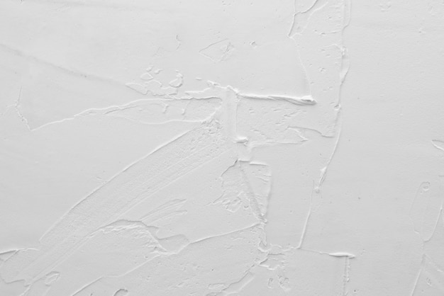 Texture de plâtre blanc. Texture de plâtre blanc. Couvrant le mur de béton de la maison. Surface rugueuse. Réparation et construction. Surface rugueuse. Réparation et construction.