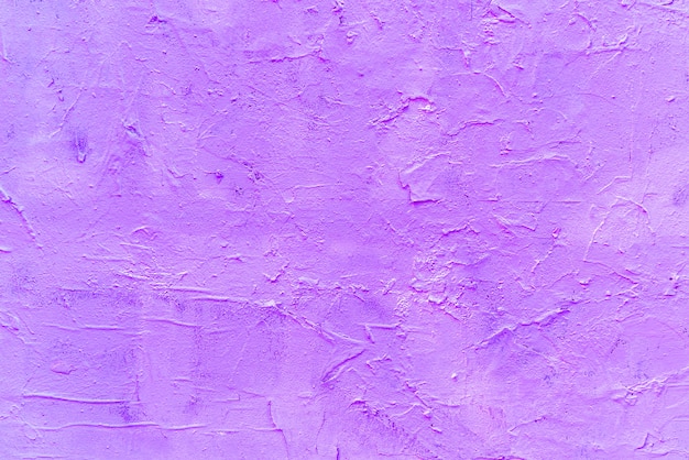 Texture de plâtre violet. Mur brut du bâtiment.