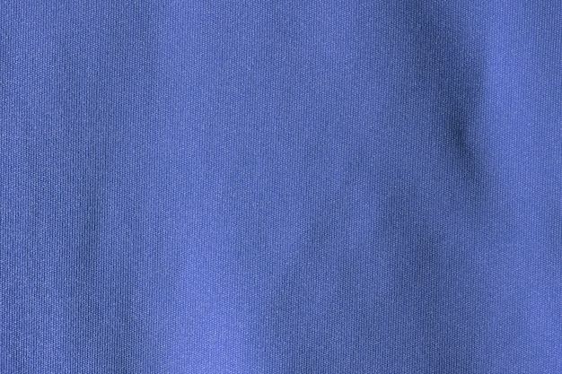 Texture de polyester de tissu bleu foncé et fond textile.