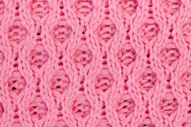 Texture de pull en tricot rose