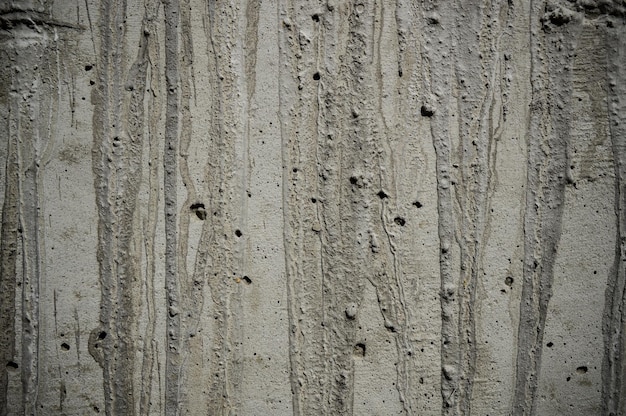 La texture rugueuse du béton poreux en détail