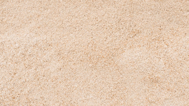 Texture de sable fond nature plage sable vue de dessus sable du désert fait