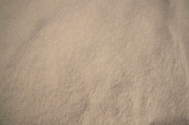 Texture de sable fond plage texturée de sable