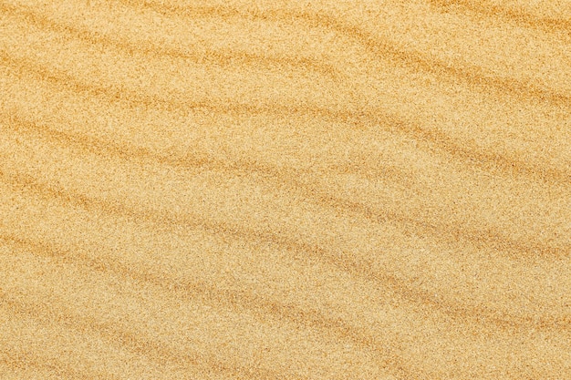 Texture de sable Plage de sable pour le fond Vue de dessus Fond de texture de pierre de sable naturel