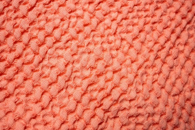 Texture de serviette en coton corail