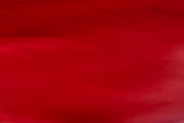 Texture de soie de fond d'art abstrait rouge et lignes d'onde en mouvement pour un design de luxe classique