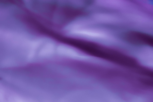 Texture de soie de fond d'art abstrait violet et lignes d'onde en mouvement pour un design de luxe classique