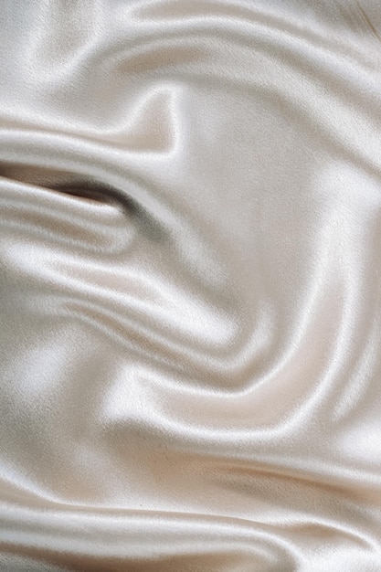 Texture de soie lisse argentée de soie de beauté