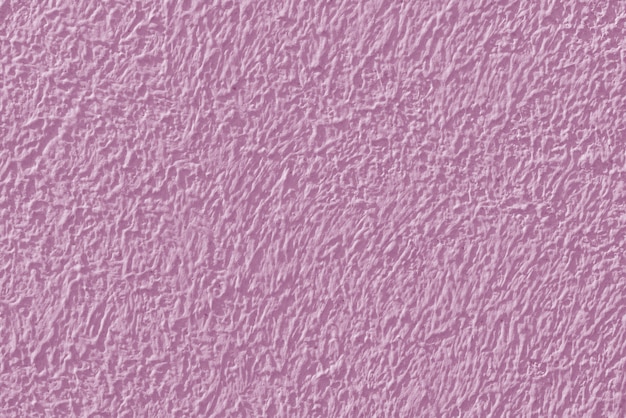 Texture de stuc rose d'un mur