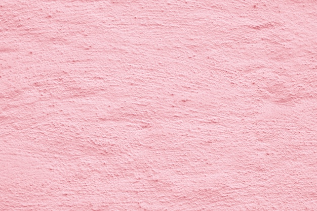 Texture de la surface architecturale en stuc rose