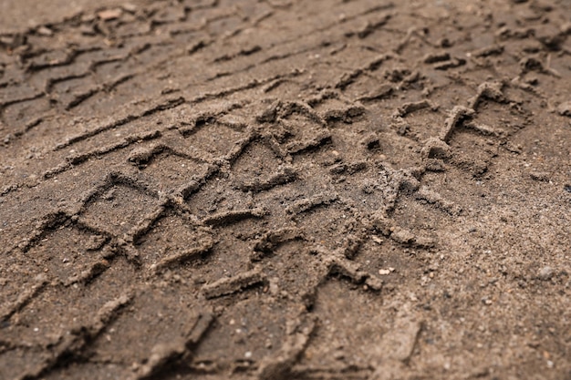 La texture de la surface du sol humide comme gros plan d'arrière-plan