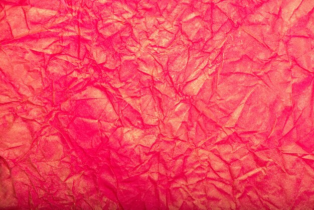 Texture ou surface de papier froissé rose