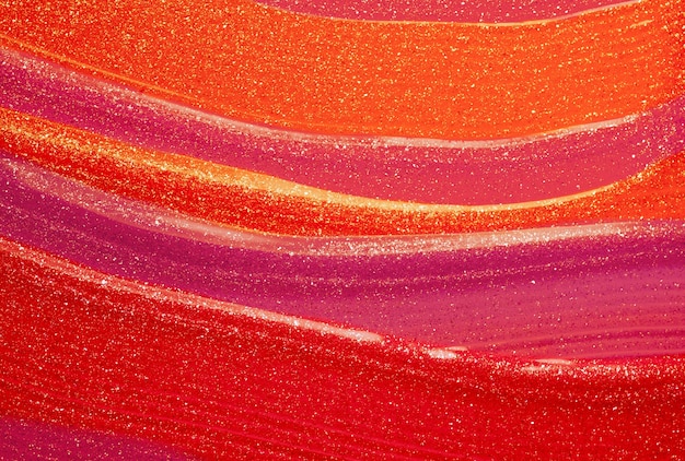 Texture tachée de rouge à lèvres multicolore brillant