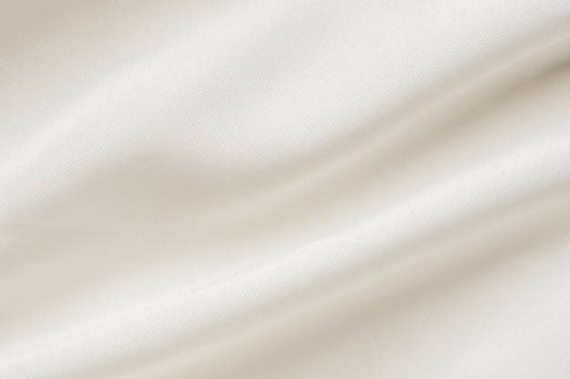 Texture de tissu blanc abstrait avec un fond ondulé doux