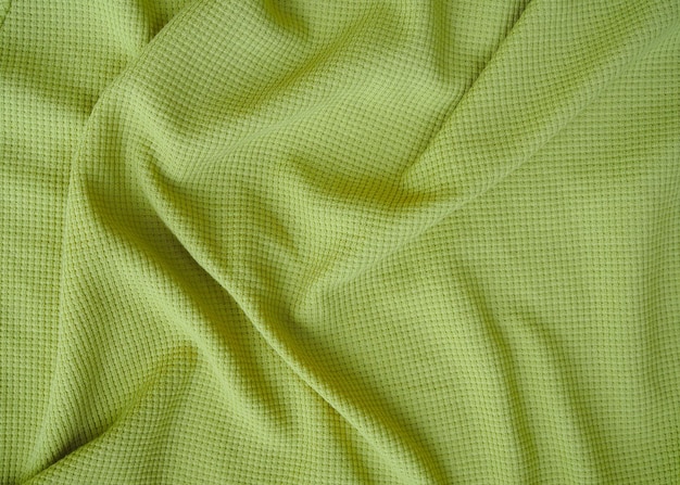 Texture de tissu de coton naturel, soie ou lin, matière textile, fond de tissu vert