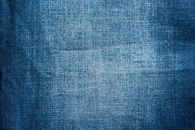 Texture de tissu de jeans bleu pour le fond et le motif