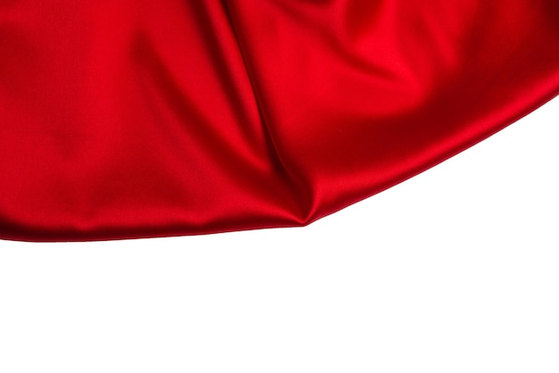 La texture de tissu de luxe en soie rouge ou en satin peut être utilisée comme arrière-plan abstrait Vue de dessus