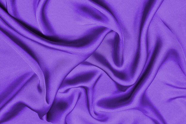 Texture de tissu de luxe en soie violette ou en satin Vue de dessus