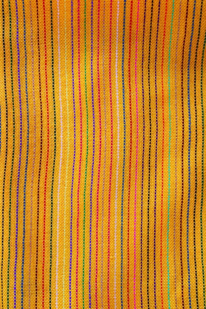 Texture de tissu macro jaune vif mexicain serape