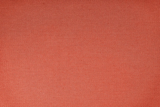 Texture de tissu rouge motif de tissage diagonal fond textile décoratif