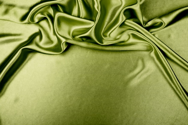 Photo texture de tissu satin de luxe vert pour le fond