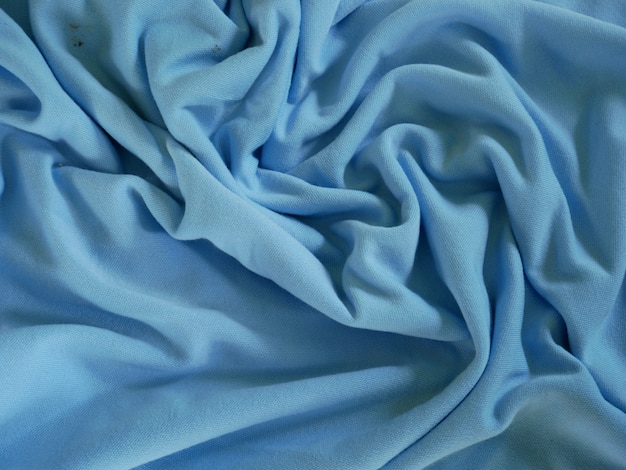 texture de tissu de soie bleue, fond de tissu