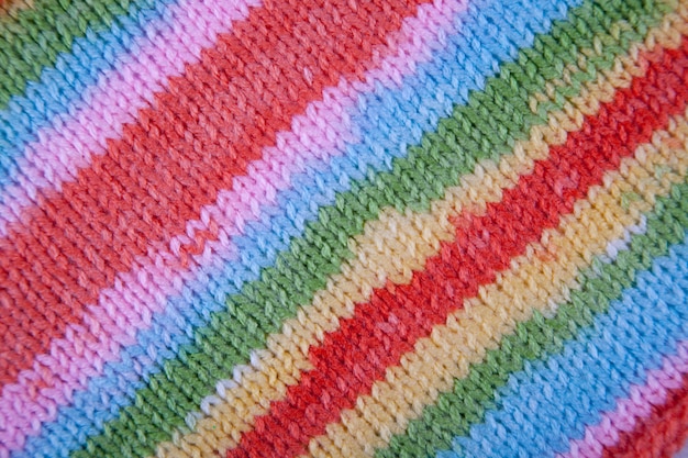 Texture de tissu tricoté à rayures. Résumé gros plan de fond de ligne