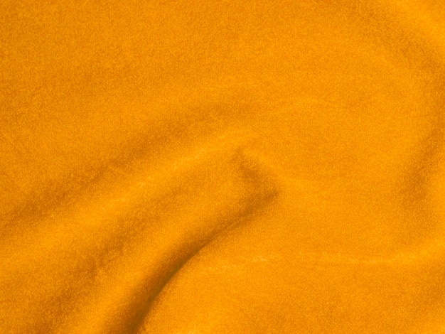 Texture de tissu de velours jaune utilisée comme arrière-plan Fond de tissu jaune vide de matière textile douce et lisse Il y a de l'espace pour textx9