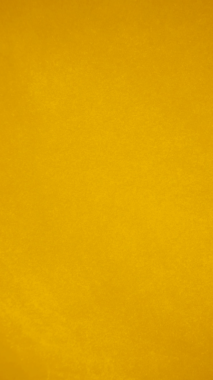 Photo texture de tissu de velours jaune utilisée comme arrière-plan fond de tissu jaune vide de matière textile douce et lisse il y a de l'espace pour textx9