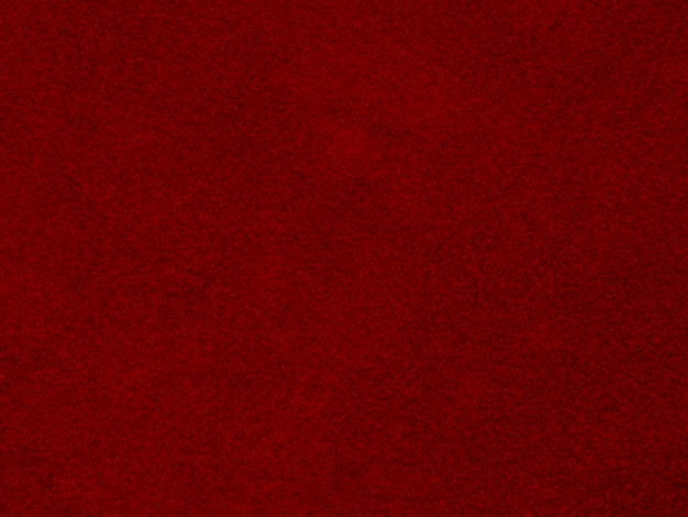 Texture de tissu de velours rouge utilisé comme arrière-plan Fond de tissu rouge vide de matière textile douce et lisse Il y a de l'espace pour le texte