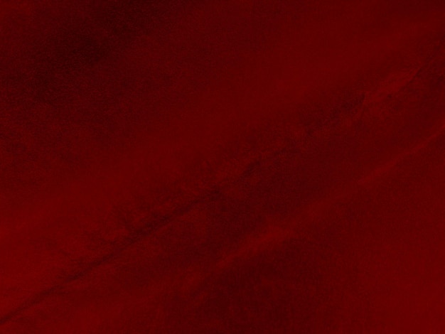 Texture de tissu de velours rouge utilisé comme arrière-plan Fond de tissu rouge vide de matière textile douce et lisse Il y a de l'espace pour le texte