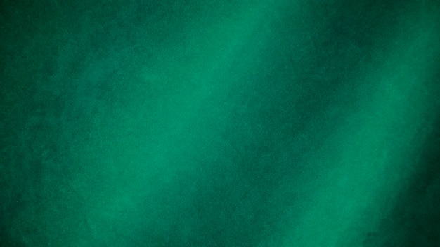 Texture de tissu de velours vert utilisé comme arrière-plan Fond de tissu vert vide de matière textile douce et lisse Il y a de l'espace pour le texte
