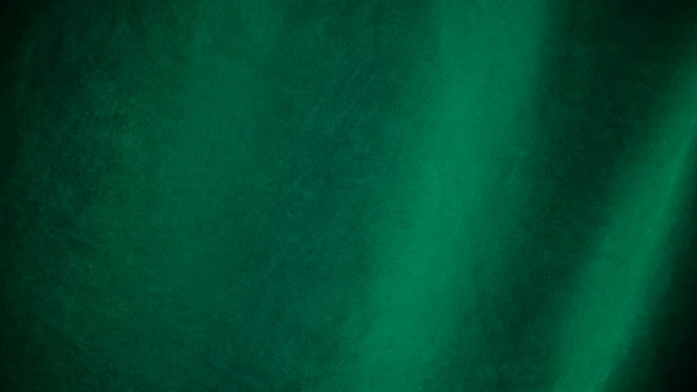 Texture de tissu de velours vert utilisé comme arrière-plan Fond de tissu vert vide de matière textile douce et lisse Il y a de l'espace pour le texte