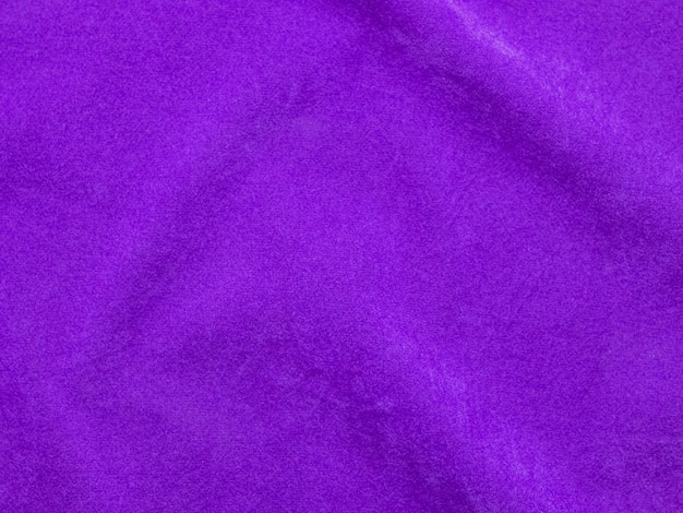 Texture de tissu de velours violet utilisé comme arrière-plan Fond de tissu violet vide de matière textile douce et lisse Il y a de l'espace pour le texte