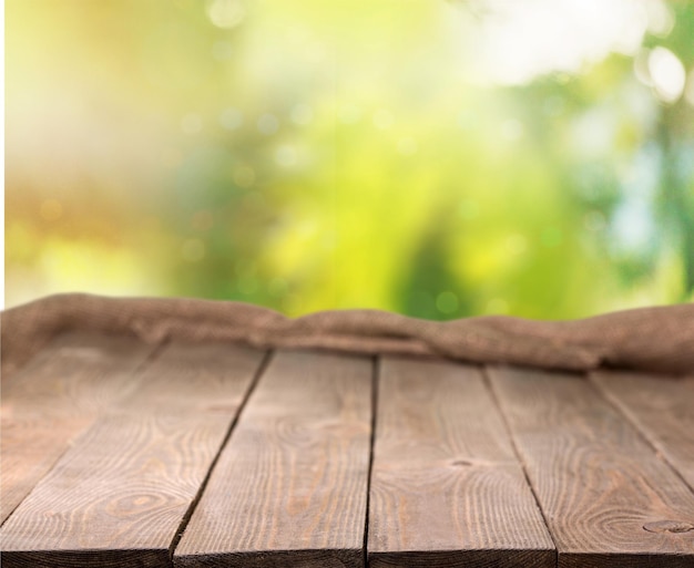 Texture de toile de jute sur une table en bois avec place pour le texte