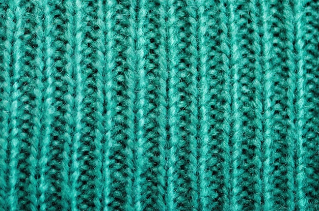 Texture tricotée Tissu à motifs en laine Espace de copie de fond turquoise