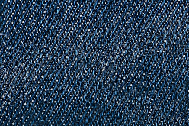 Texture uniforme du tissu denim bleu foncé